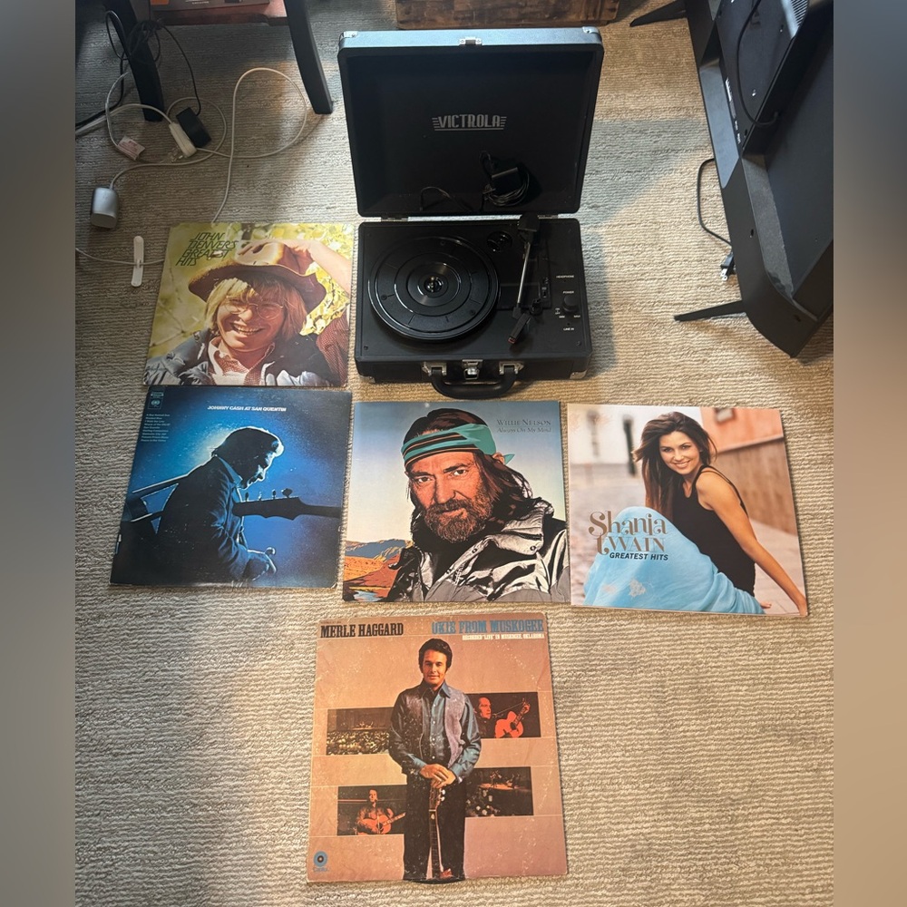 Black Portable Record Player and 5 records